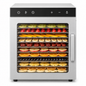A stainless steel multi-tier fruit and vegetable dehydrator with a black control panel and handle, shown filled with various sliced fruits and vegetables on trays.