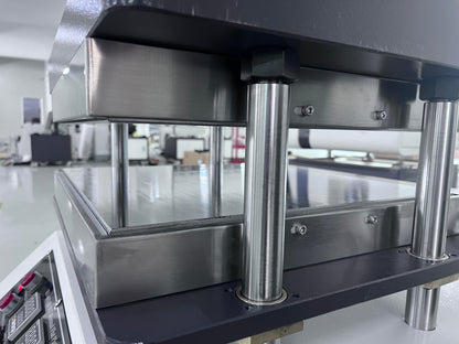Vulcanizing heat press platen frame with stainless steel columns and base plates