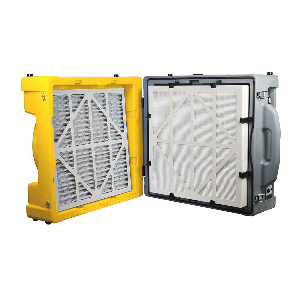 Yellow air scrubber purifier with open filter door showing gray and white filter media