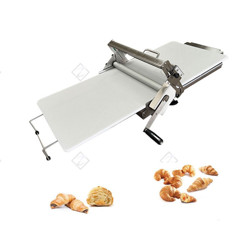 Manual dough sheeter machine with foldable pastry rollers and pastries on the side