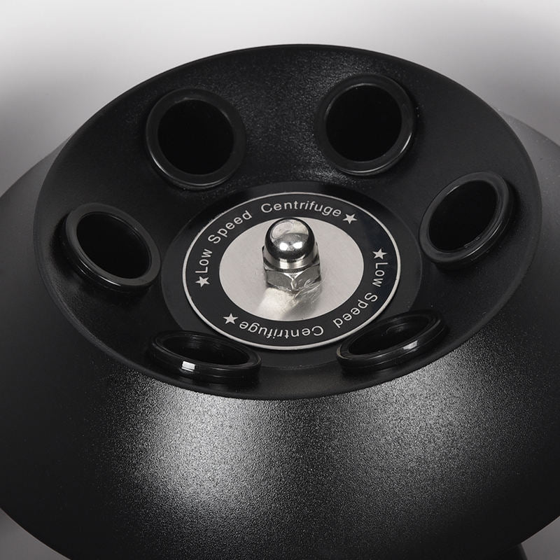 Black centrifuge rotor with four tube slots and metal center hub