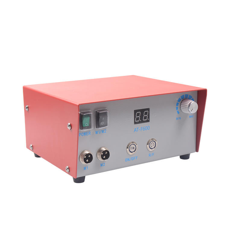 Bench-top motor polisher unit with red housing, front controls, and LED display