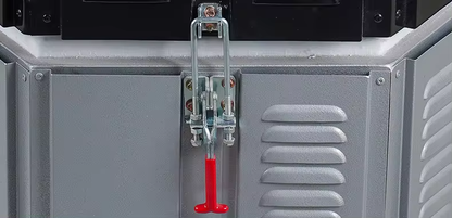 Electric ceramic kiln furnace door latch with red handle and gray insulated panels