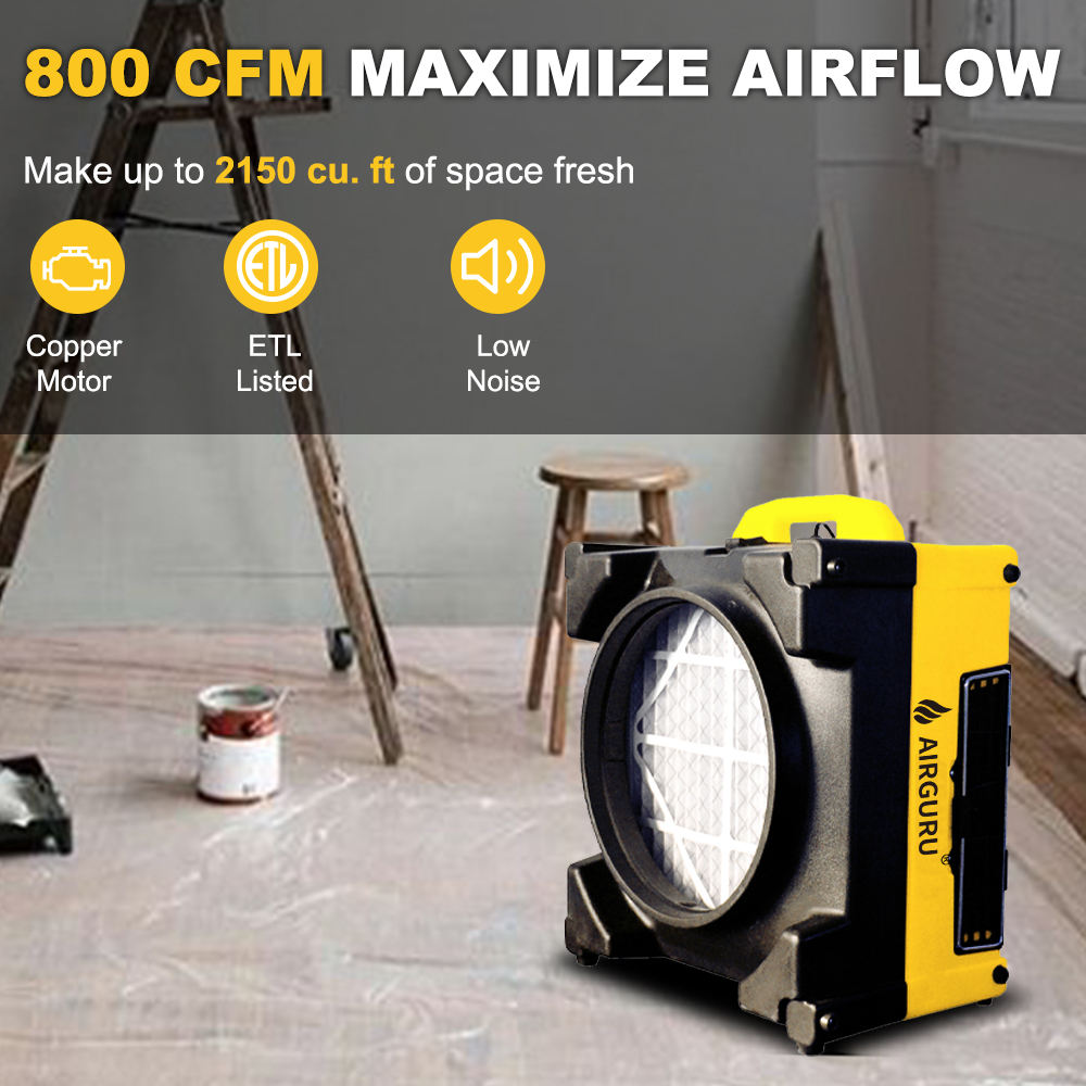 Yellow air scrubber purifier with circular front intake and visible filter panel