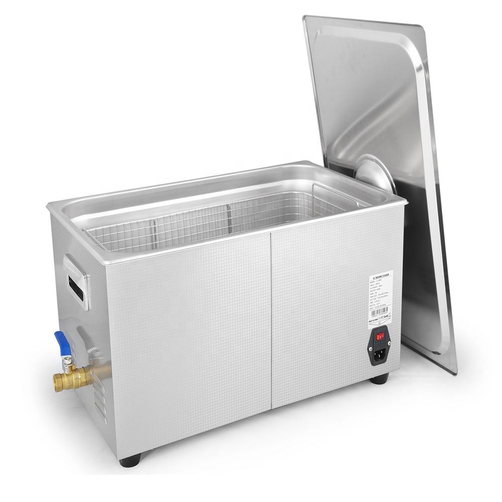 Ultrasonic cleaning machine with open lid, stainless tank, and side drain valve