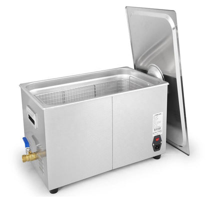 Ultrasonic cleaning machine with open lid, stainless tank, and side drain valve