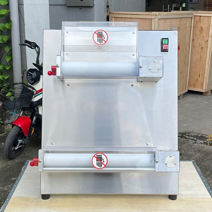 Automatic pizza dough sheeter machine front view with control lights and pressing rollers